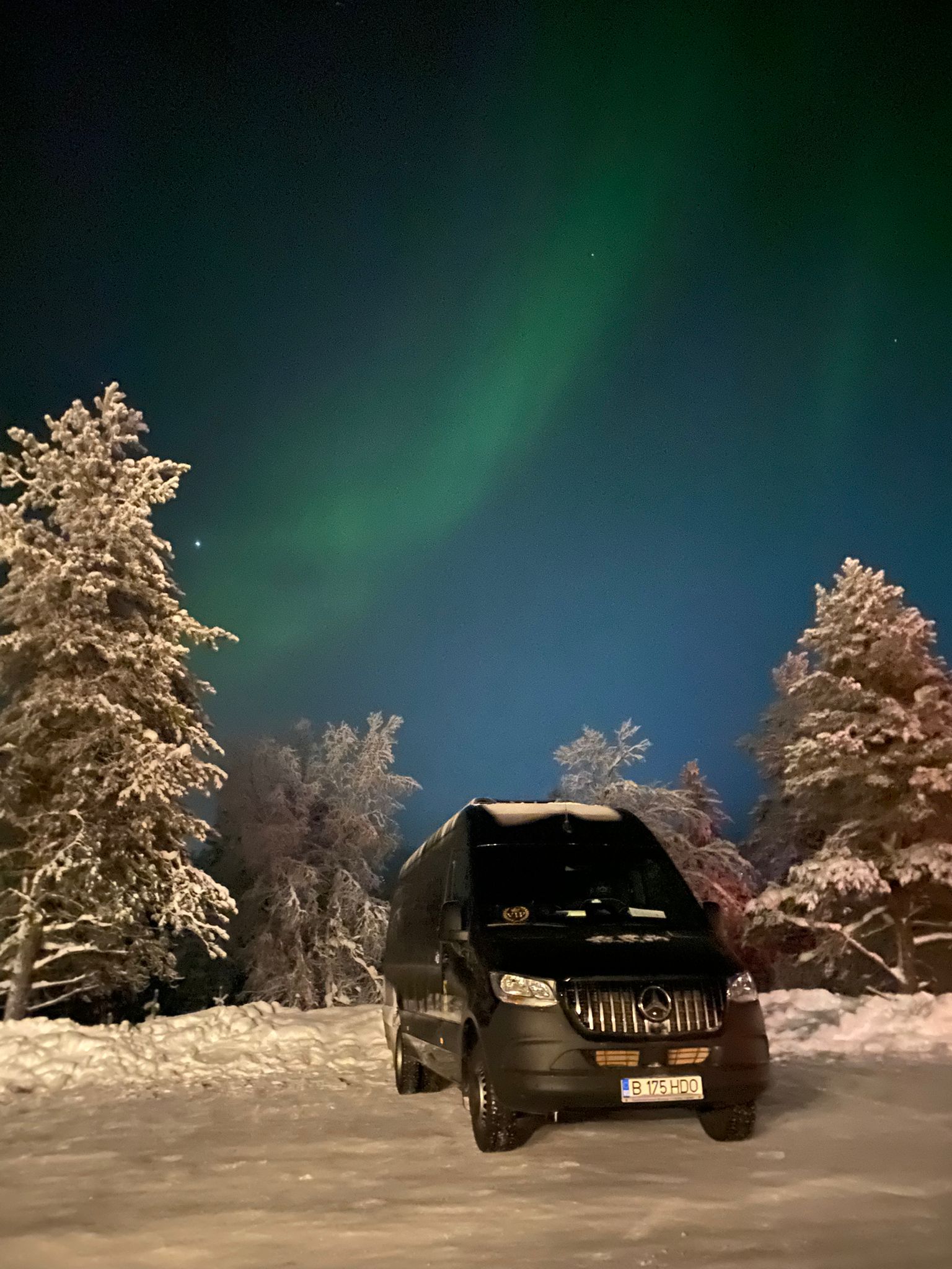 Vaffe Invest minibus under the Northern Lights