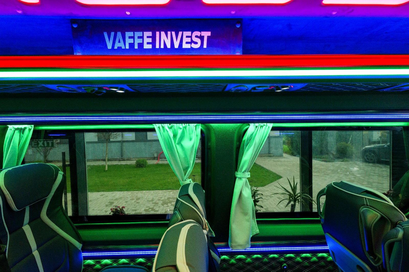 Interior with ambient lighting and Vaffe Invest logo