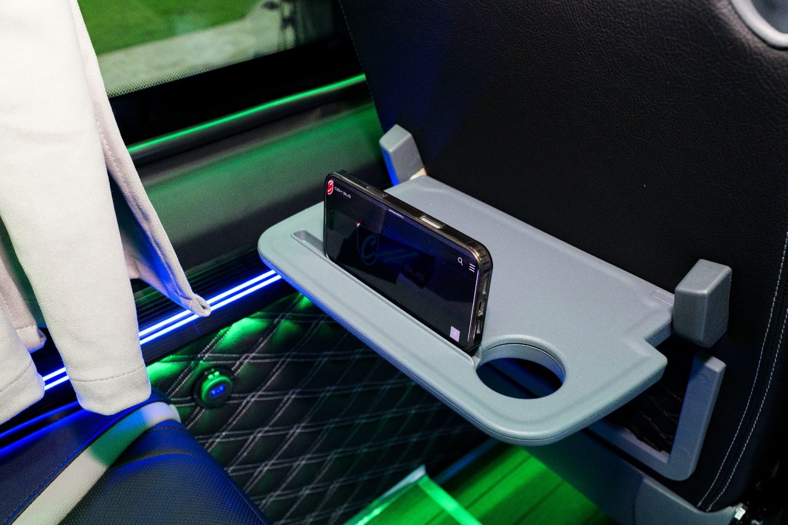 Folding table with cup and phone holder